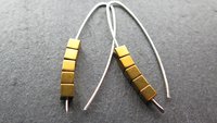gold hematite earrings. cube jewelry in gold and sterling silver earrings. mixed metal jewelry.