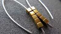 gold hematite earrings. cube jewelry in gold and sterling silver earrings. mixed metal jewelry.