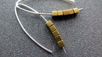 gold hematite earrings. cube jewelry in gold and sterling silver earrings. mixed metal jewelry.