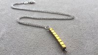 gold and silver necklace. mixed metal jewelry. modern jewellery
