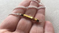 gold and silver necklace. mixed metal jewelry. modern jewellery