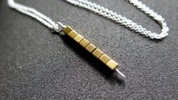 gold and silver necklace. mixed metal jewelry. modern jewellery