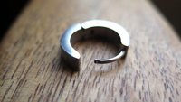 silver hoop earring for men. men's jewelry in brushed stainless steel.