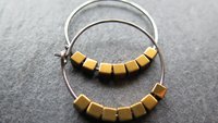 gold and silver earrings. hypoallergenic niobium hoops for sensitive ears.