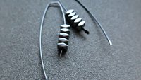 black earrings. hematite earrings in anodized niobium. hypoallergenic earwires.