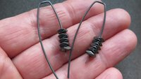 black earrings. hematite earrings in anodized niobium. hypoallergenic earwires.
