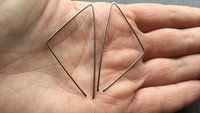 triangle earrings in niobium. hammered silver hoops. hypoallergenic jewelry. nickel free hoop earrings.