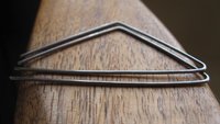 triangle earrings in niobium. hammered silver hoops. hypoallergenic jewelry. nickel free hoop earrings.