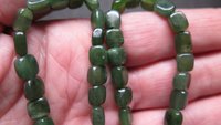 irregular cut green jade earrings. Canadian jade jewelry. small natural jade earrings.