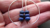 lapis earrings. cobalt blue earring. genuine lapis lazuli jewelry. dark blue stones with a matte polish.