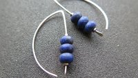lapis earrings. cobalt blue earring. genuine lapis lazuli jewelry. dark blue stones with a matte polish.