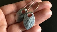 feather earring in anodized aluminum. sterling silver dangle earrings.
