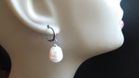 white pearl drop earrings. large freshwater pearl dangles. hypoallergenic stainless steel hoops. made in Canada.