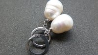 white pearl drop earrings. large freshwater pearl dangles. hypoallergenic stainless steel hoops. made in Canada.
