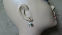 small peridot earrings. silver and green gemstone earrings. August birthstone. artisan jewelry. peridot nuggets.