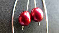red pearl earrings in sterling silver. modern freshwater pearl jewelry. 1 1/2” drop earrings. made in Calgary, Canada