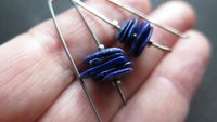 modern blue lapis earrings with hematite. grey niobium wires for sensitive ears. lapis lazuli jewellery.