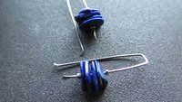 modern blue lapis earrings with hematite. grey niobium wires for sensitive ears. lapis lazuli jewellery.