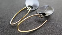 unique black dangle earring with gold earwires. modern anodized aluminum jewelry. splurge.