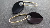 unique black dangle earring with gold earwires. modern anodized aluminum jewelry. splurge.