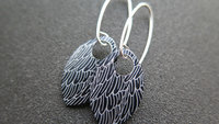 black wing earrings. anodized aluminum jewelry. sterling silver ear wire. splurge.