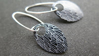 black wing earrings. anodized aluminum jewelry. sterling silver ear wire. splurge.