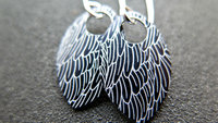 black wing earrings. anodized aluminum jewelry. sterling silver ear wire. splurge.