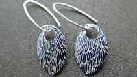 black wing earrings. anodized aluminum jewelry. sterling silver ear wire. splurge.