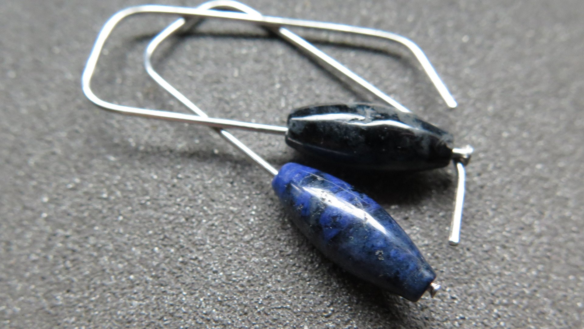 blue sodalite earrings. hypoallergenic stainless steel jewelry for sensitive ears. navy blue and black stones.