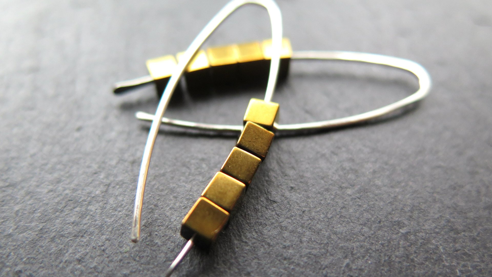 gold hematite earrings. cube jewelry in gold and sterling silver earrings. mixed metal jewelry.