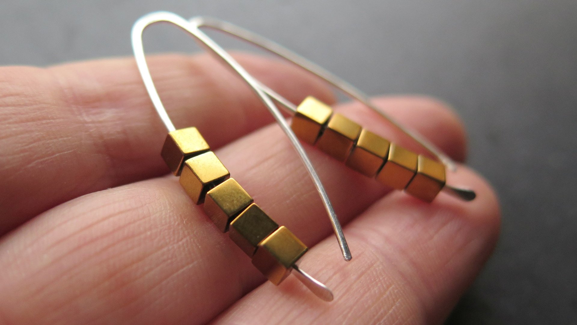 gold hematite earrings. cube jewelry in gold and sterling silver earrings. mixed metal jewelry.