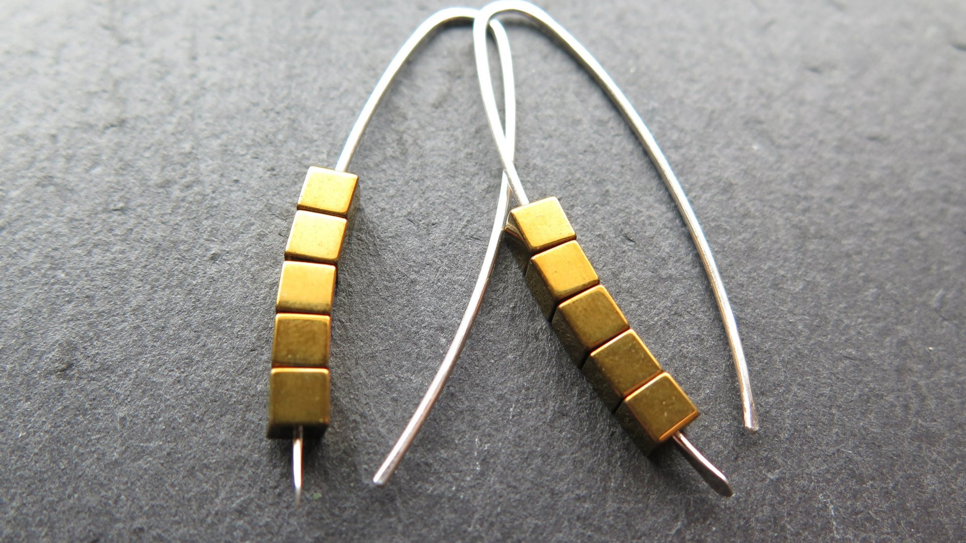 gold hematite earrings. cube jewelry in gold and sterling silver earrings. mixed metal jewelry.