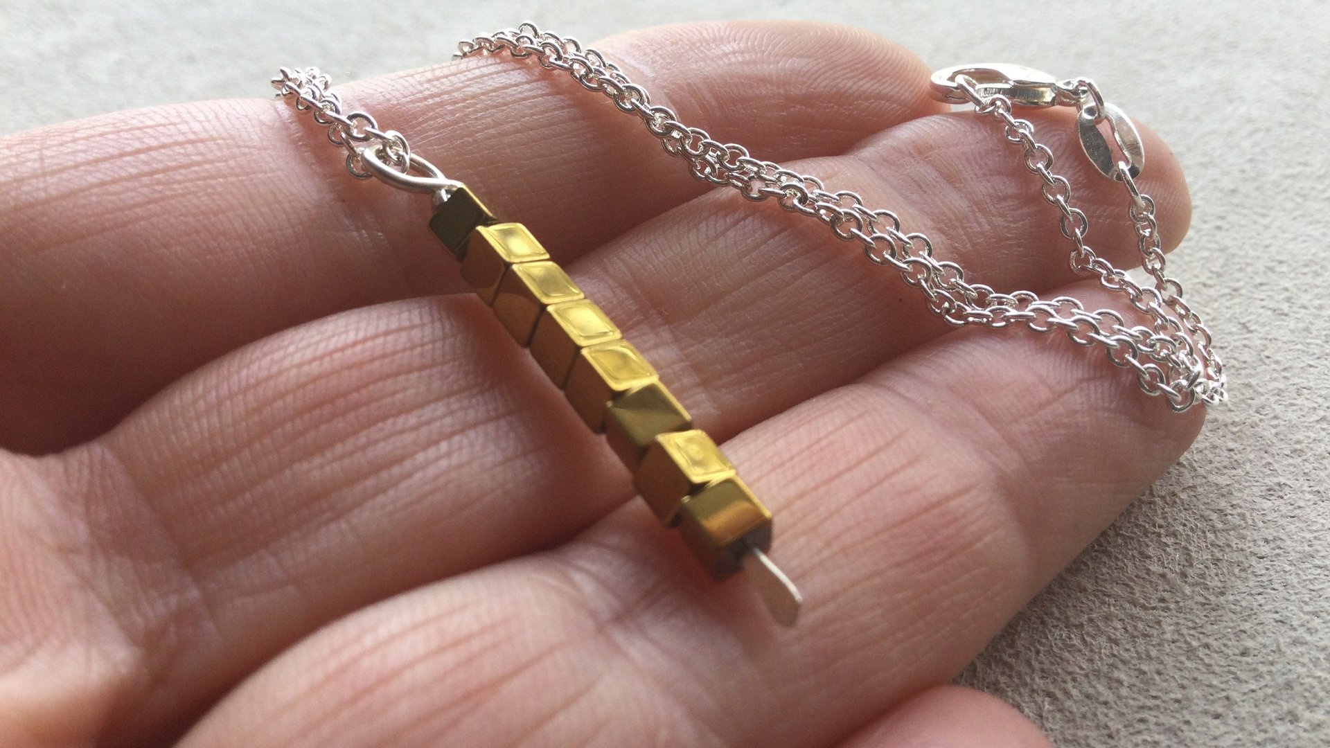 gold and silver necklace. mixed metal jewelry. modern jewellery