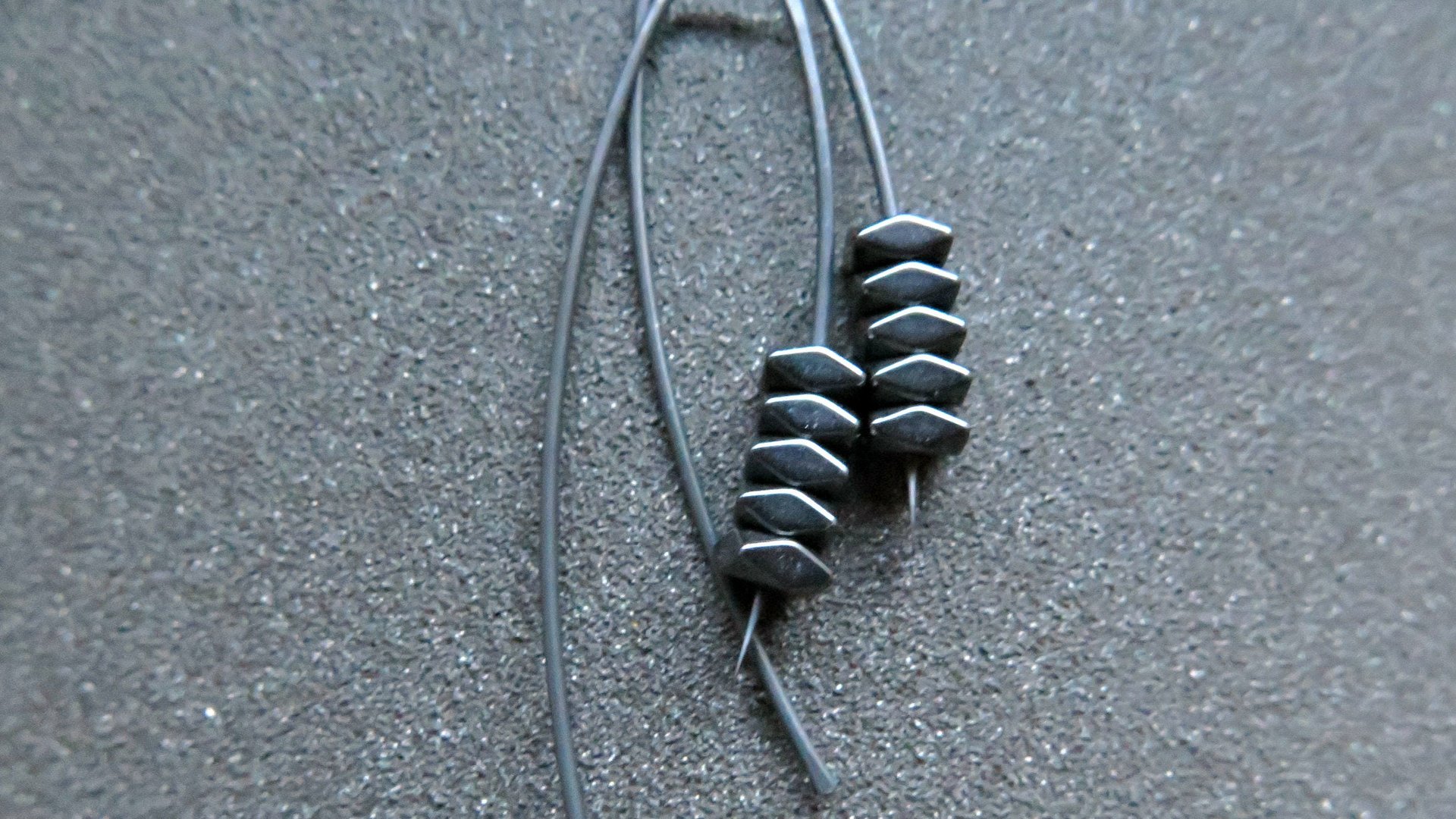 black earrings. hematite earrings in anodized niobium. hypoallergenic earwires.