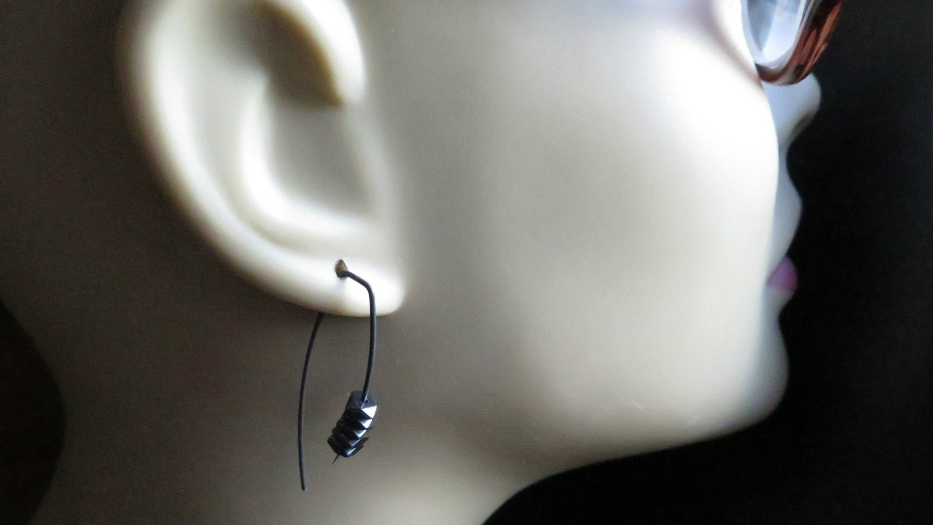 black earrings. hematite earrings in anodized niobium. hypoallergenic earwires.