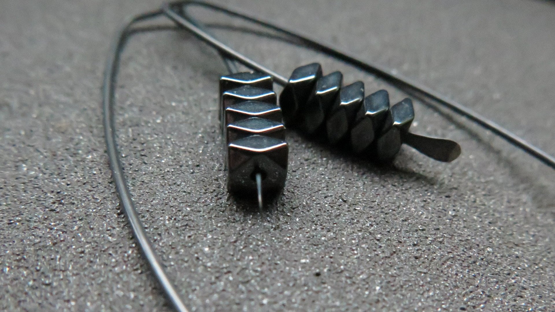 black earrings. hematite earrings in anodized niobium. hypoallergenic earwires.