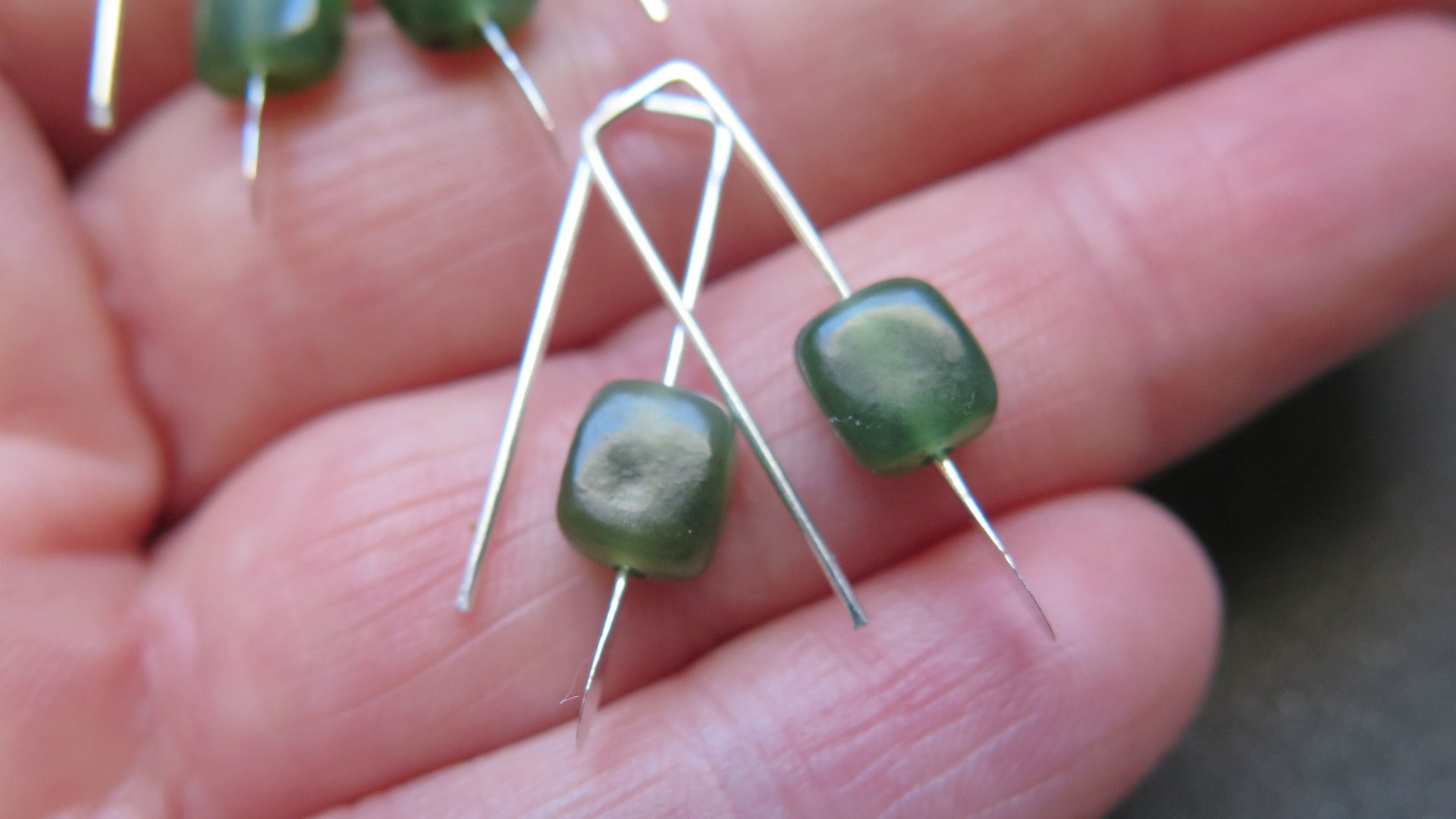 irregular cut green jade earrings. Canadian jade jewelry. small natural jade earrings.