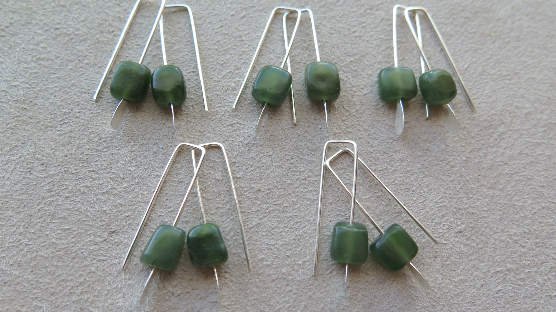 irregular cut green jade earrings. Canadian jade jewelry. small natural jade earrings.