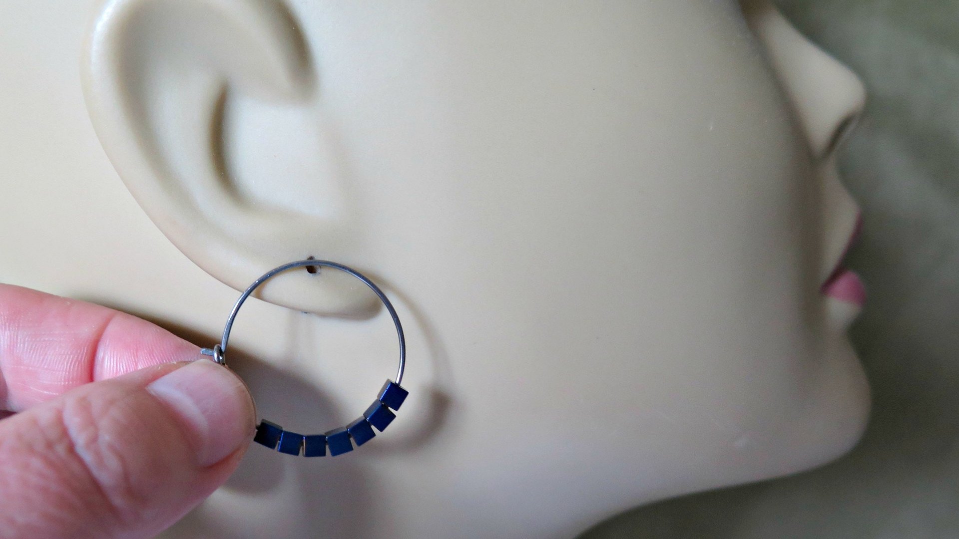 indigo earrings with hematite cubes. hypoallergenic niobium hoops for sensitive ears. modern purple blue jewelry.