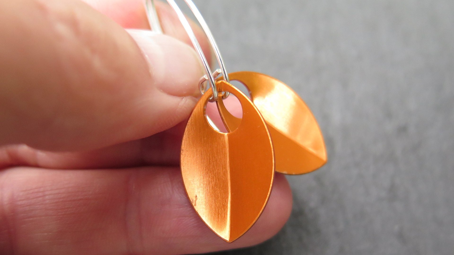 modern orange earrings. anodized aluminum dangle. sterling silver ear wire. splurge.