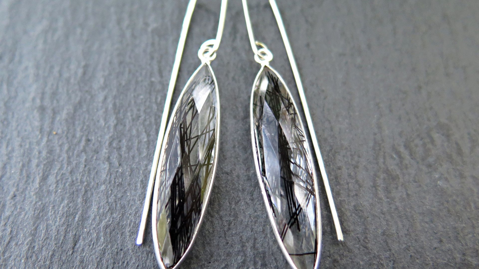 artisan rutilated quartz earrings in sterling silver. gorgeous black dangle earrings in sterling silver. natural gemstone jewellery