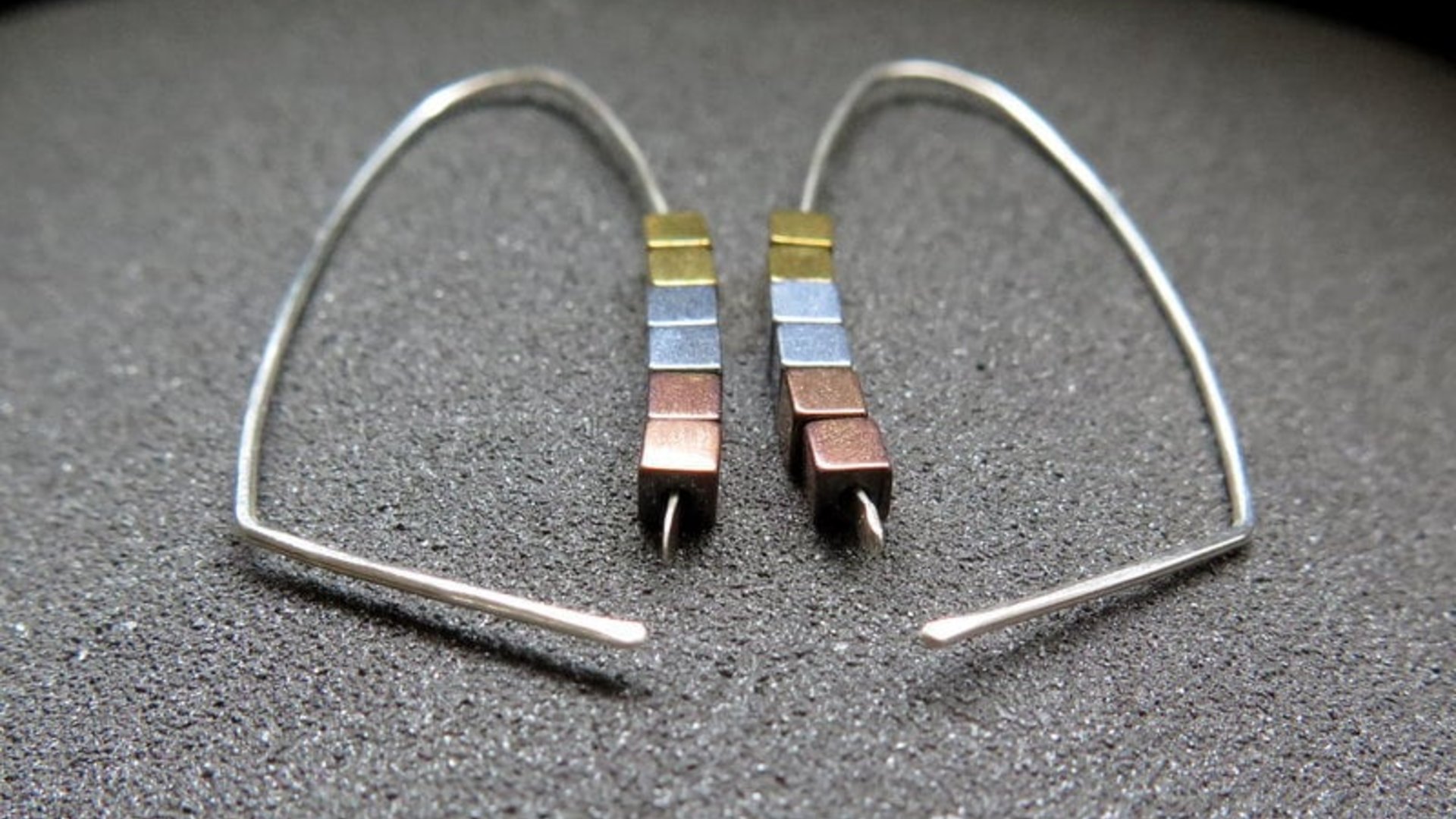 gold, silver and copper earrings. modern cube hematite hoops. metallic jewelry.