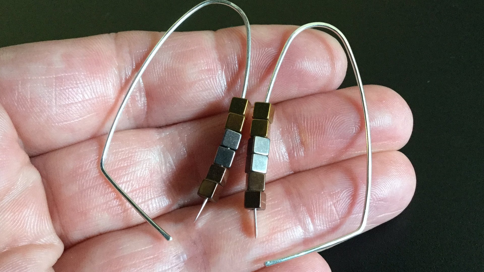 gold, silver and copper earrings. modern cube hematite hoops. metallic jewelry.
