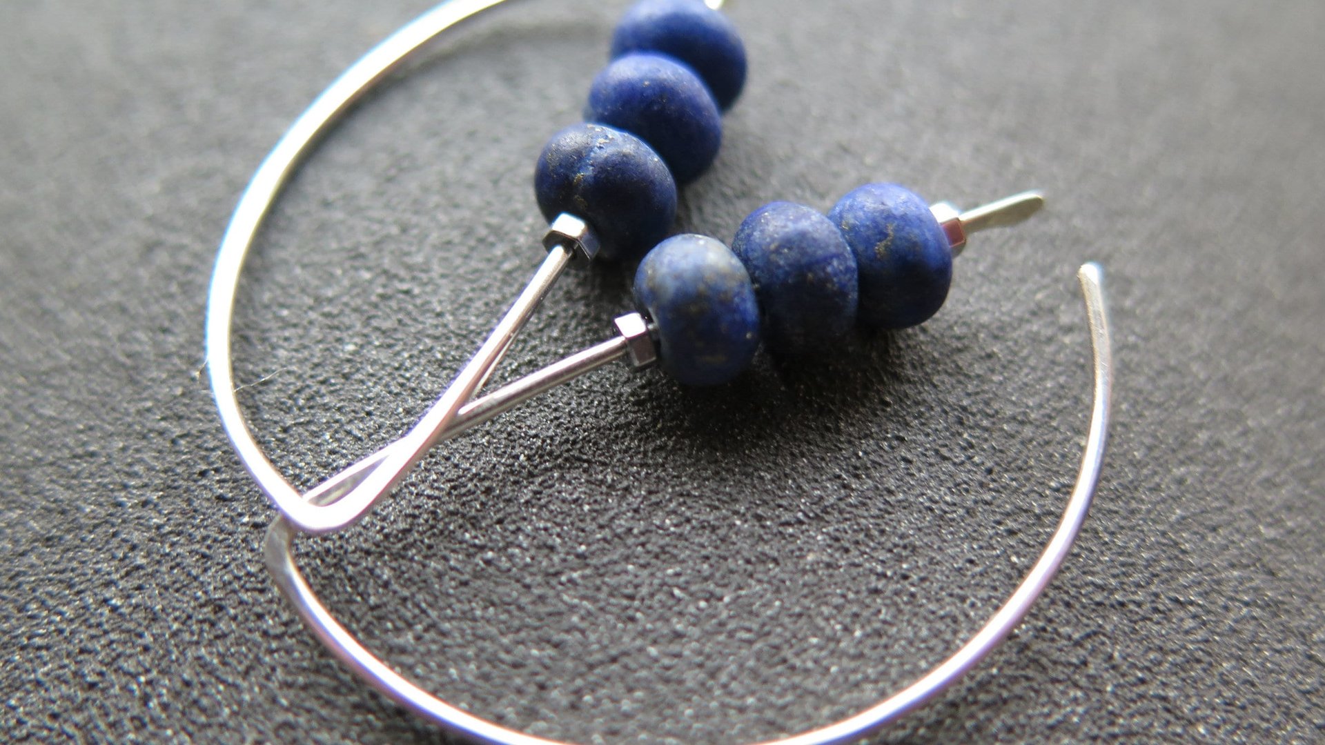 lapis earrings. cobalt blue earring. genuine lapis lazuli jewelry. dark blue stones with a matte polish.