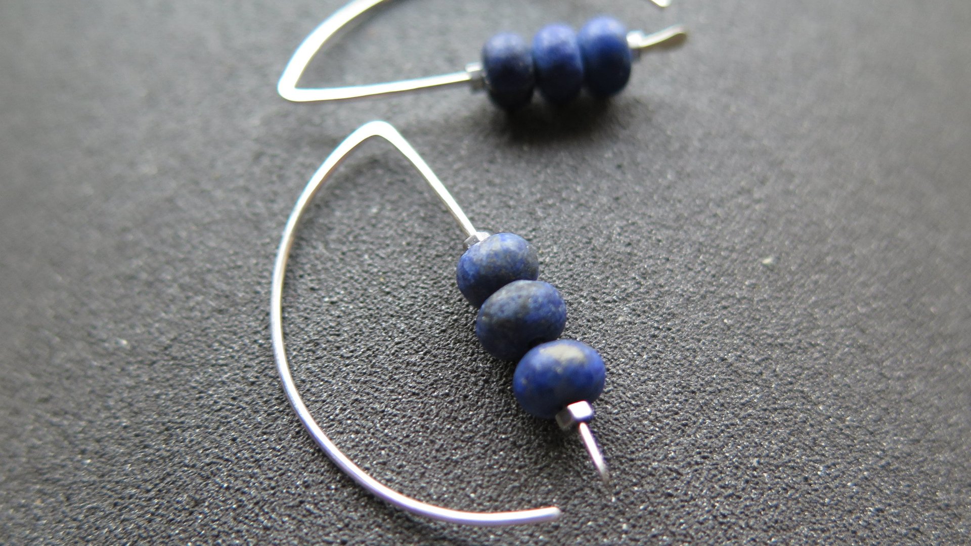 lapis earrings. cobalt blue earring. genuine lapis lazuli jewelry. dark blue stones with a matte polish.