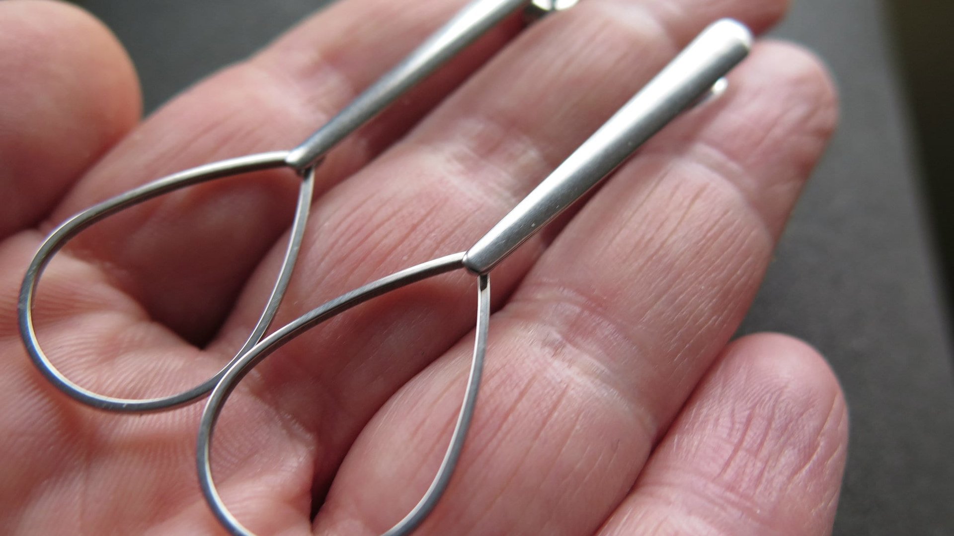 modern stainless steel earrings. contemporary hypoallergenic jewelry. silver teardrop earrings. made in Canada
