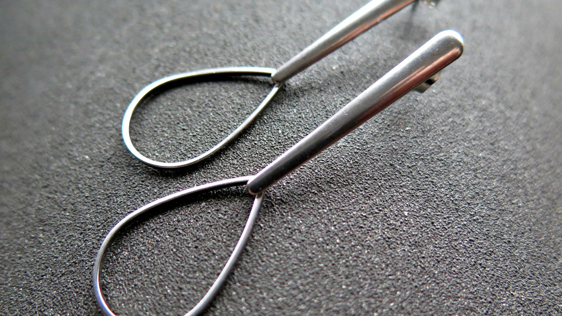 modern stainless steel earrings. contemporary hypoallergenic jewelry. silver teardrop earrings. made in Canada