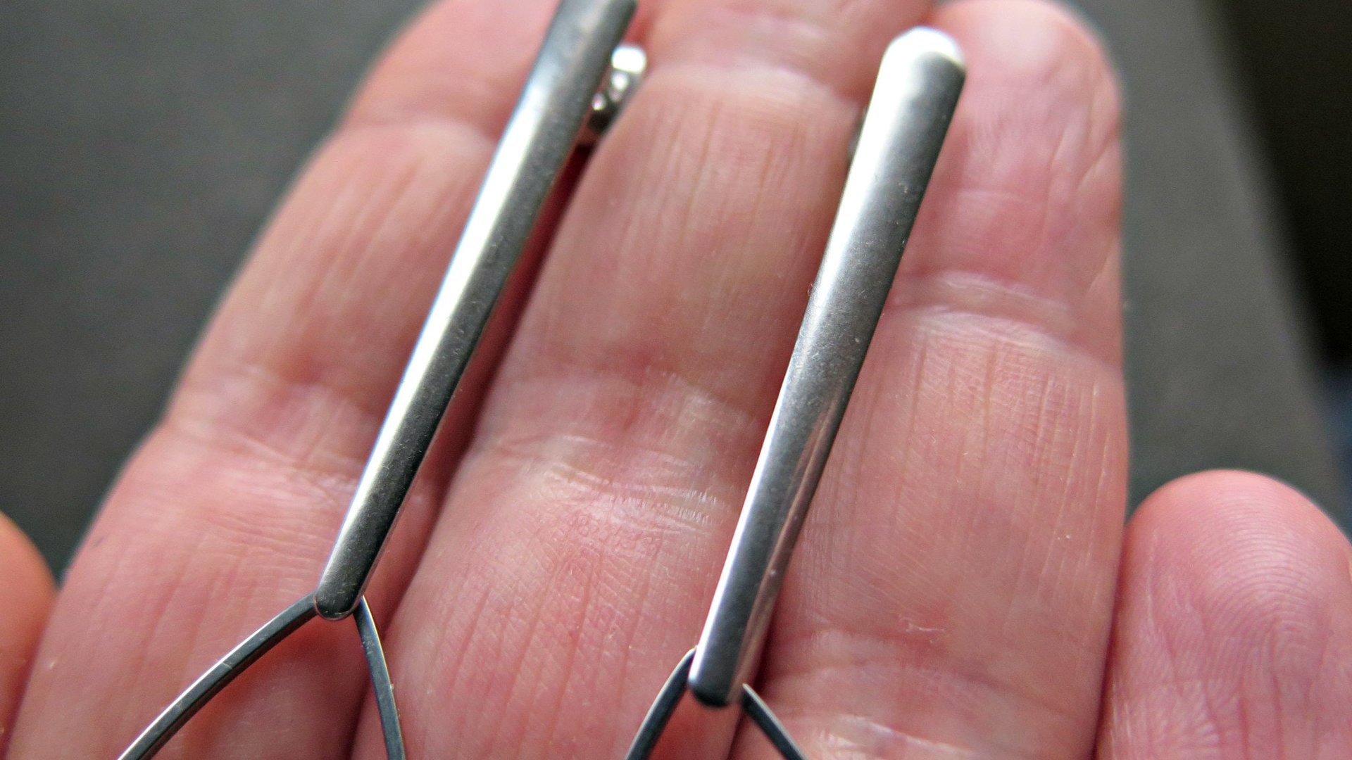 modern stainless steel earrings. contemporary hypoallergenic jewelry. silver teardrop earrings. made in Canada