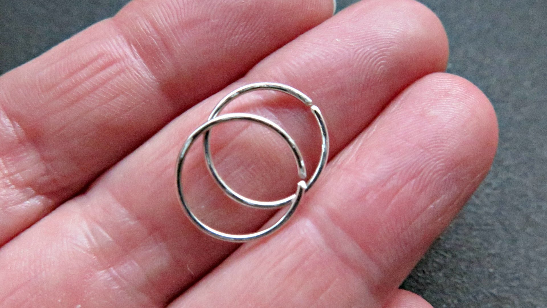 small silver hoop earrings. 12 mm sterling silver sleeper hoops. 20 gauge wire.