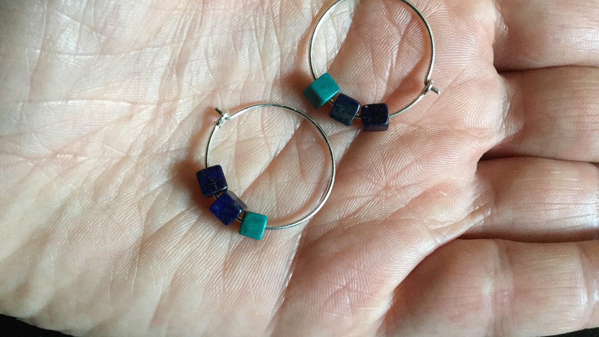 small silver hoops with cube stones